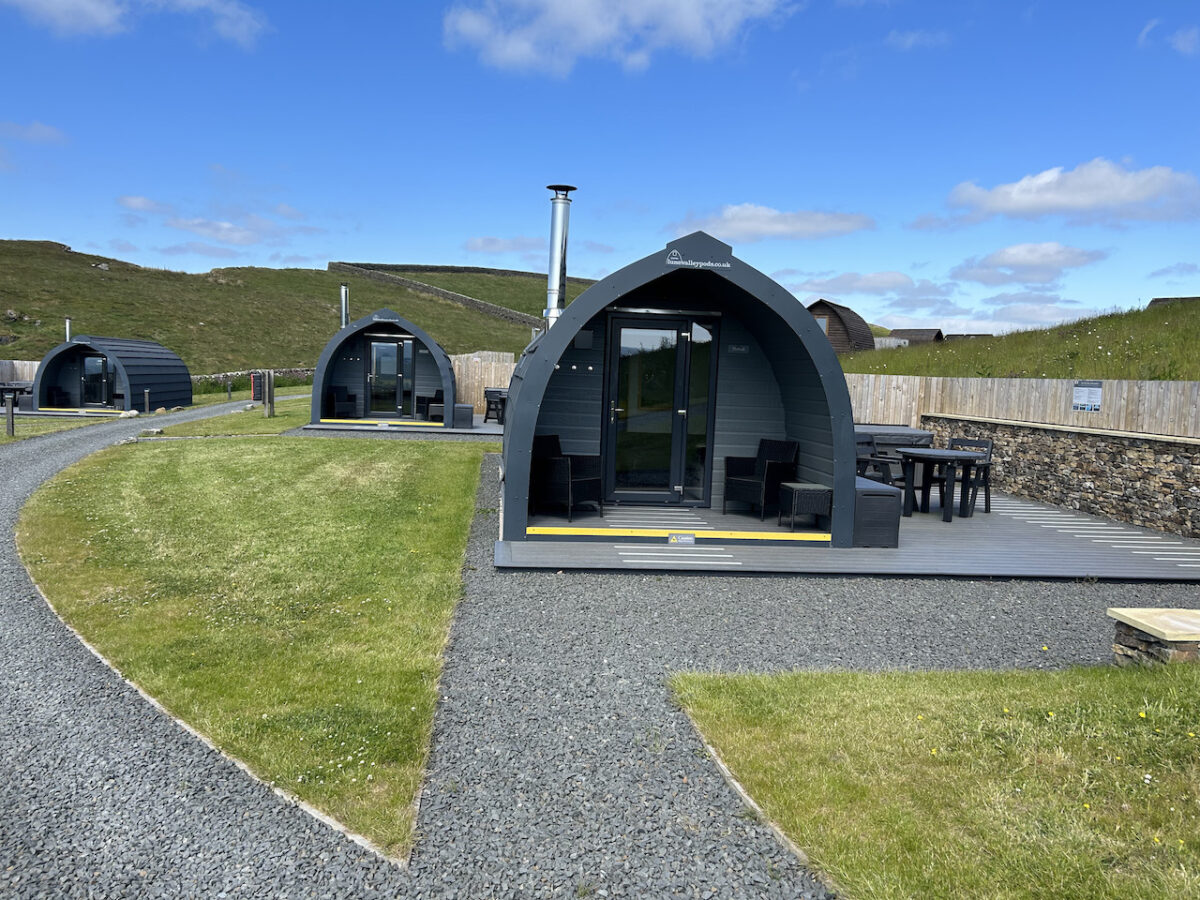 Castle pods at Herding Hill Farm are luxurious and include a spacious decking area and hot tub