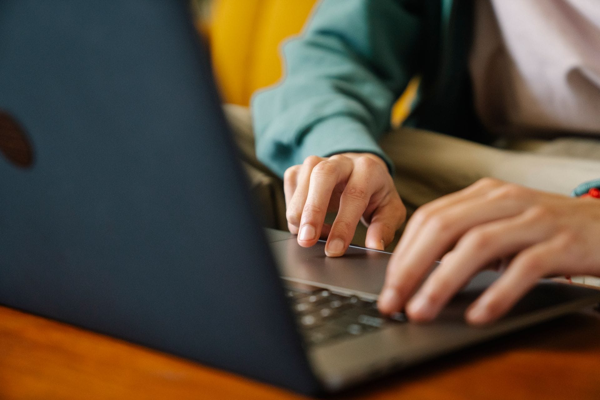 Person searching for used luxury cars online