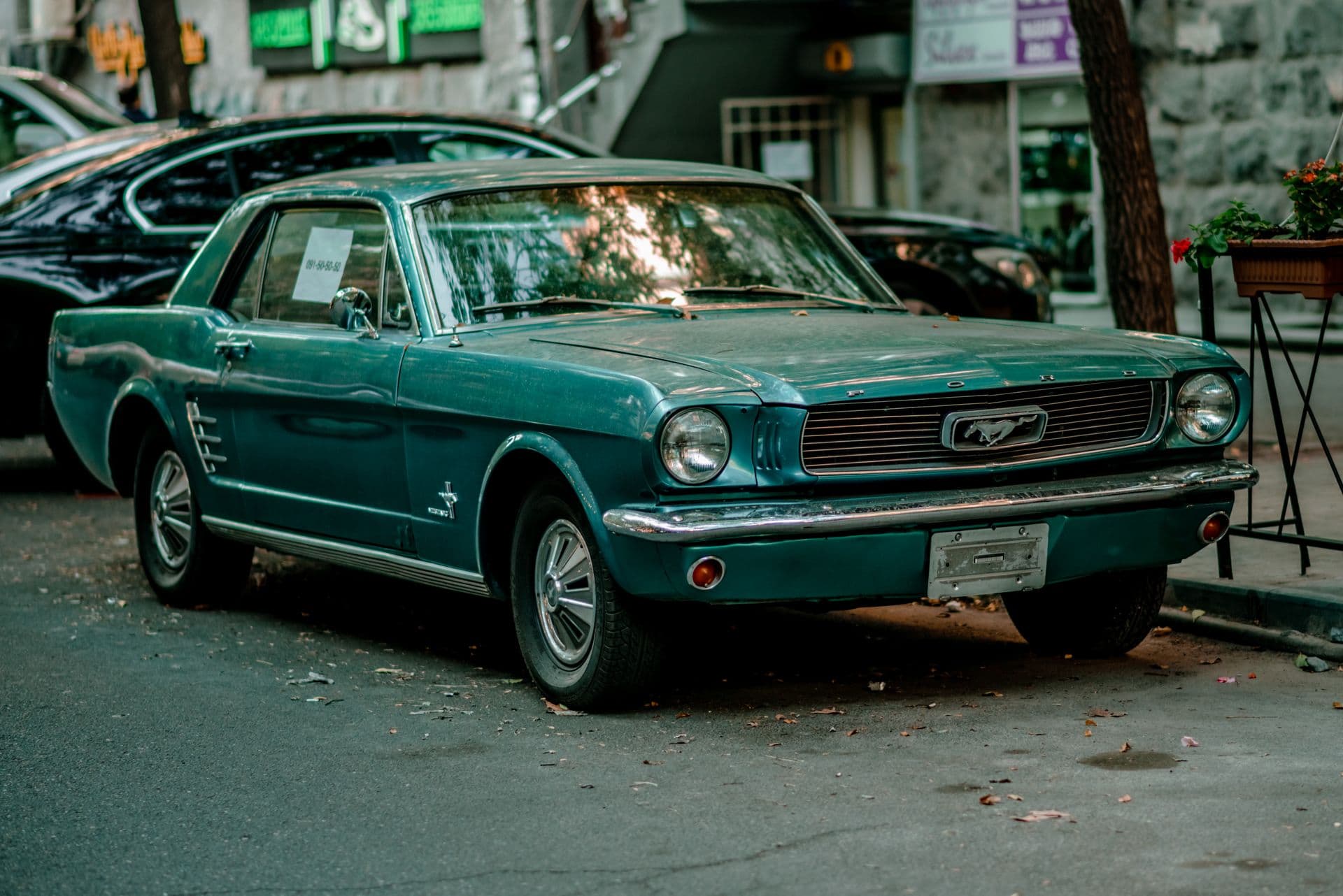 Retro Ford Mustang parked on British road