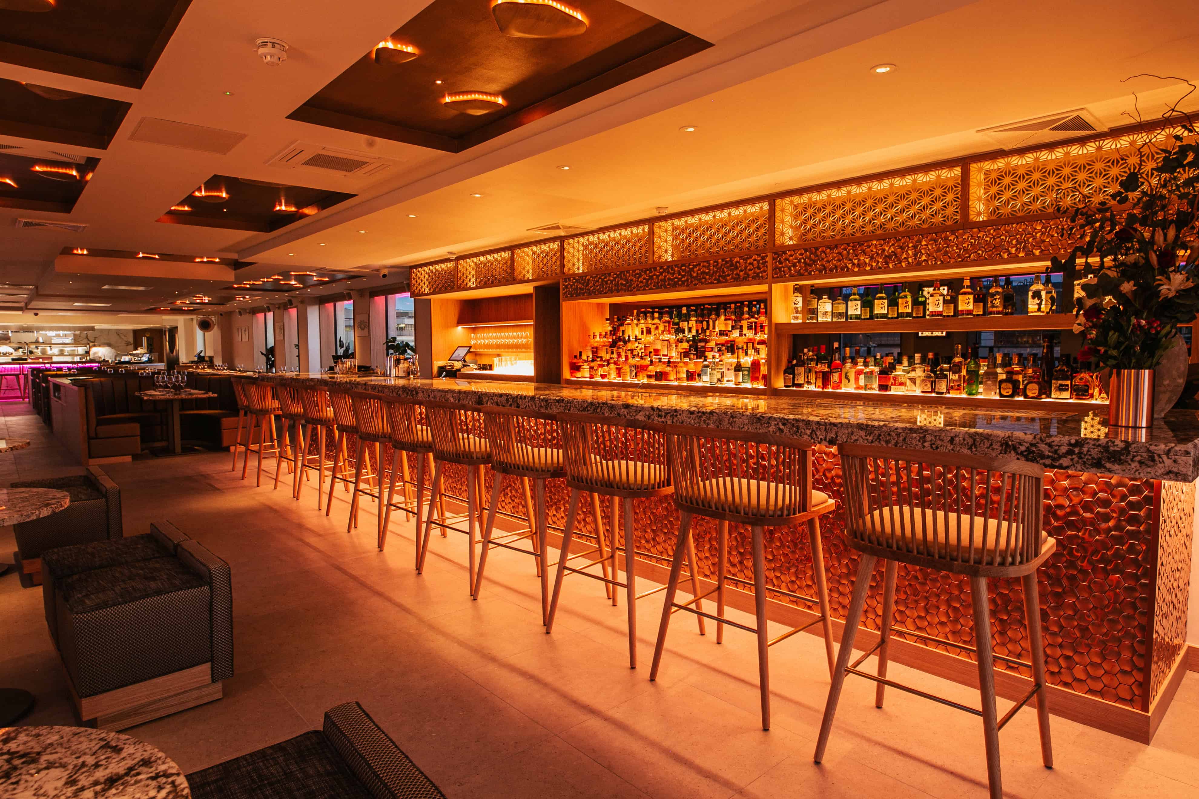 The gorgeous indoor space at Bisushima includes a full bar area