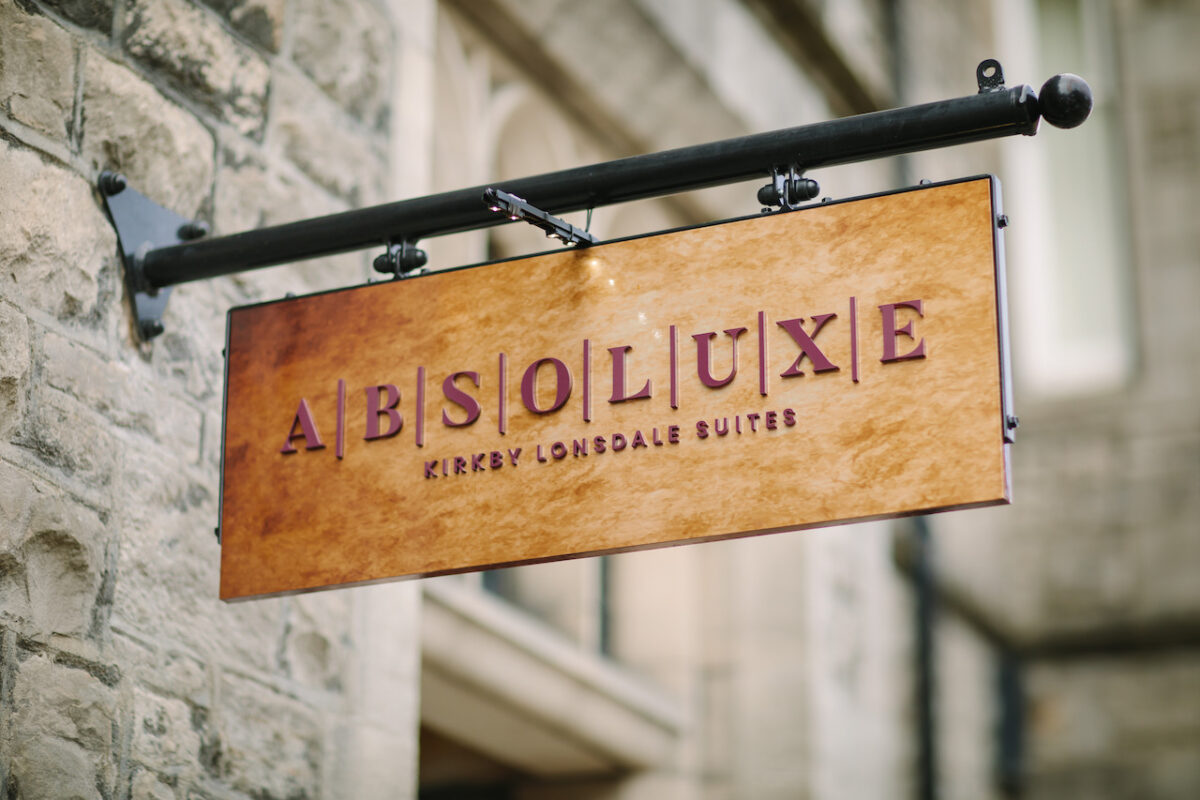 Absoluxe Suites - There's a jaw dropping hidden gem behind this sign...!
