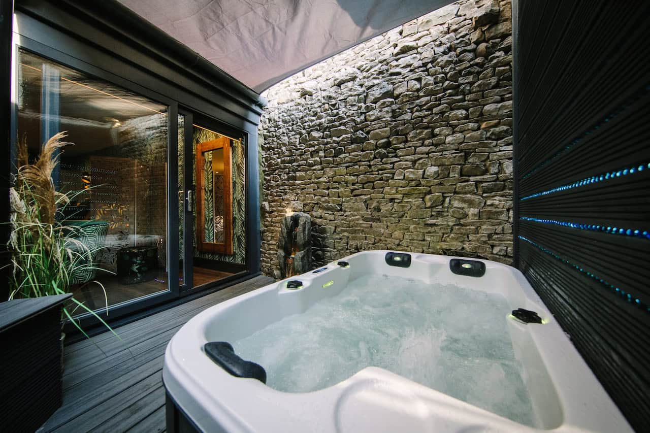 The most luxurious stays involve a private hot tub and you'll love this one which comes with the Oasis suite at Absoluxe Suites
