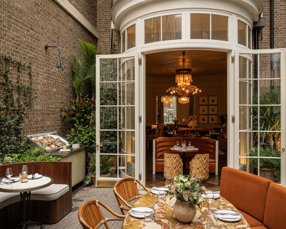 Just off Hanover Square in London, The Maine Mayfair is rich with British style and elegance decorated with striped awnings, elegant wicker furniture and plenty of greenery