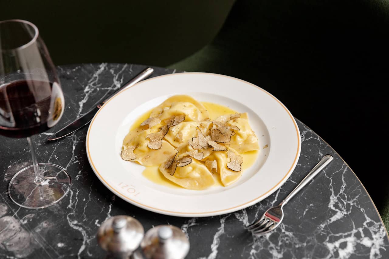 A must-try at TOZI Grand Cafe - Buffalo ricotta ravioli with black truffle  (J W Howard Photo)