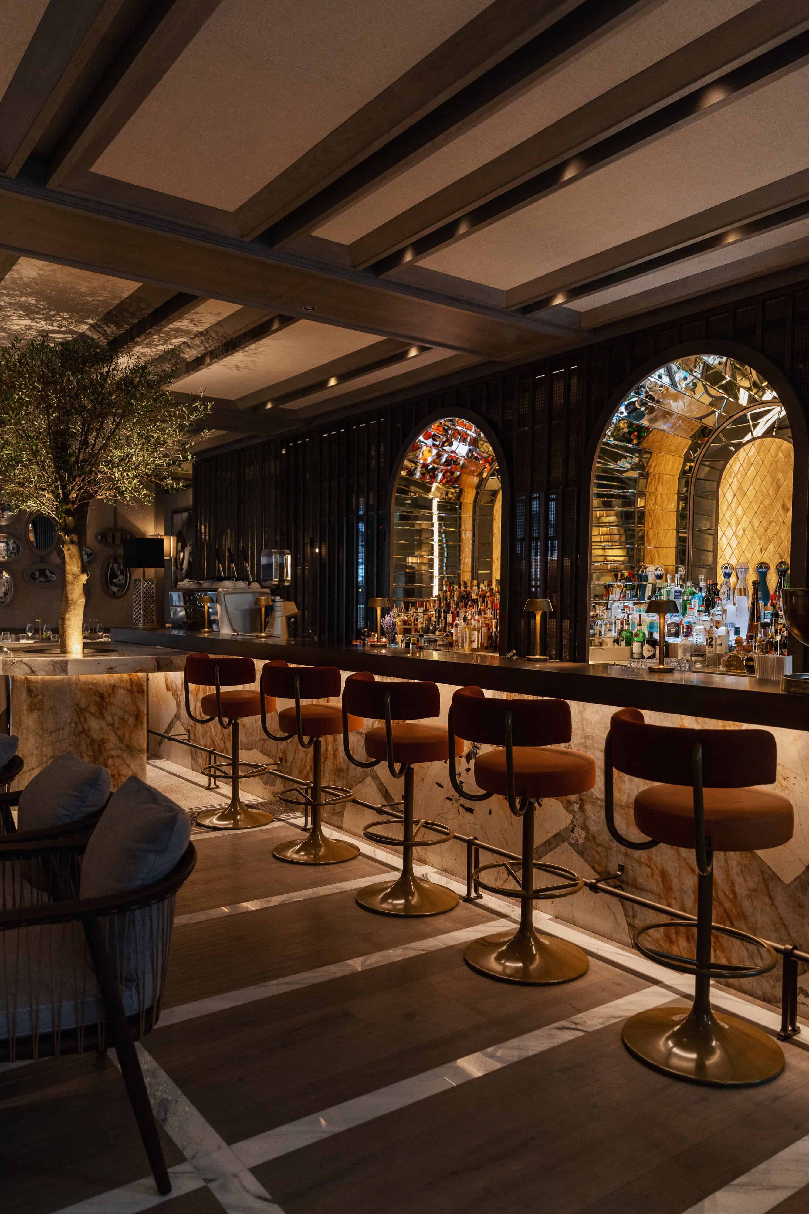 Paper Moon's luxurious bar area at Raffles at the OWO