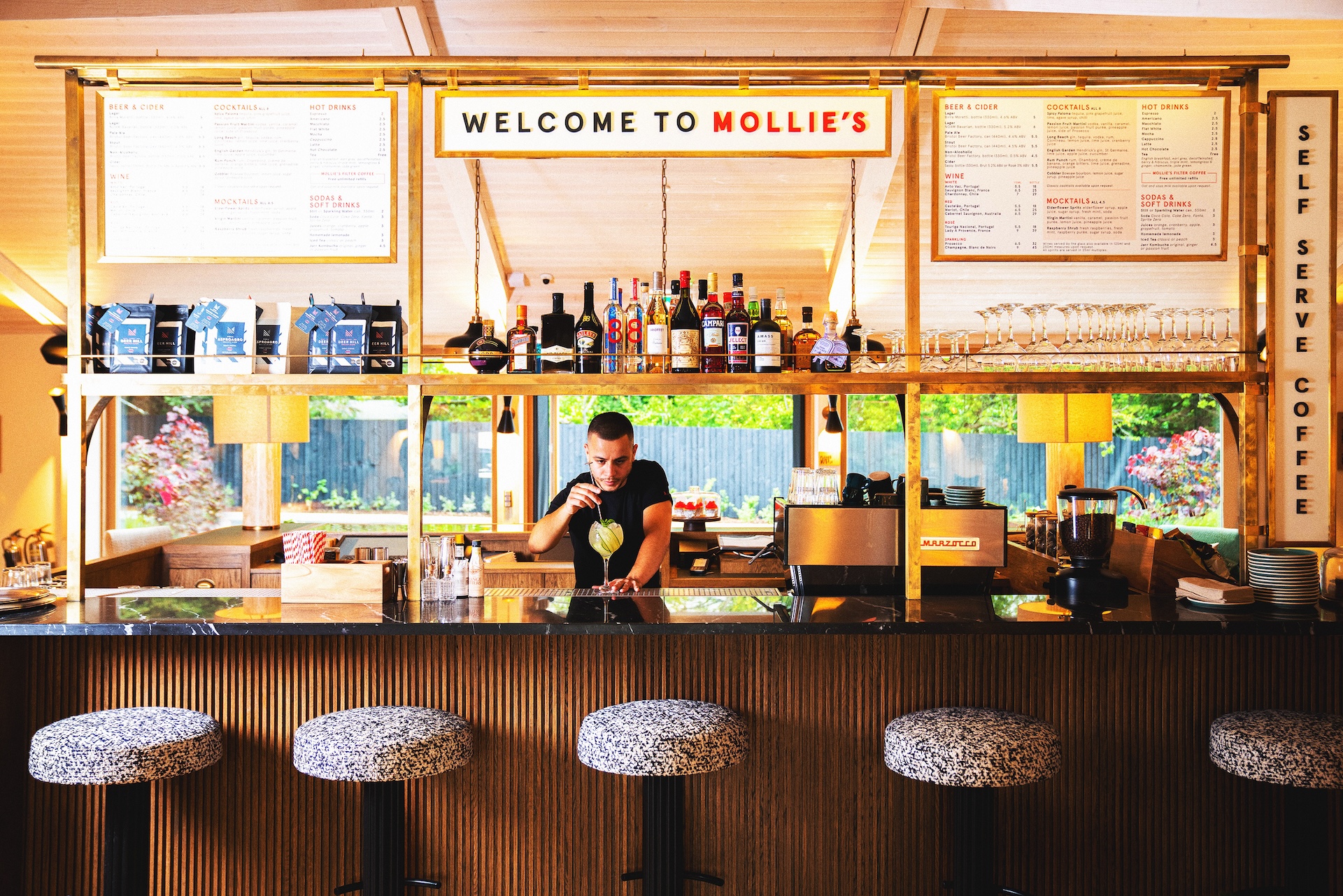 The lounge is cosy and comfortable with plenty of seating and a central bar