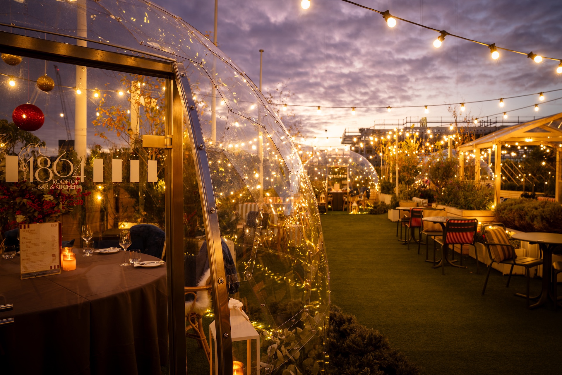 Festive igloos and twinkly lights on the 1864 Rooftop at John Lewis on Oxford Street