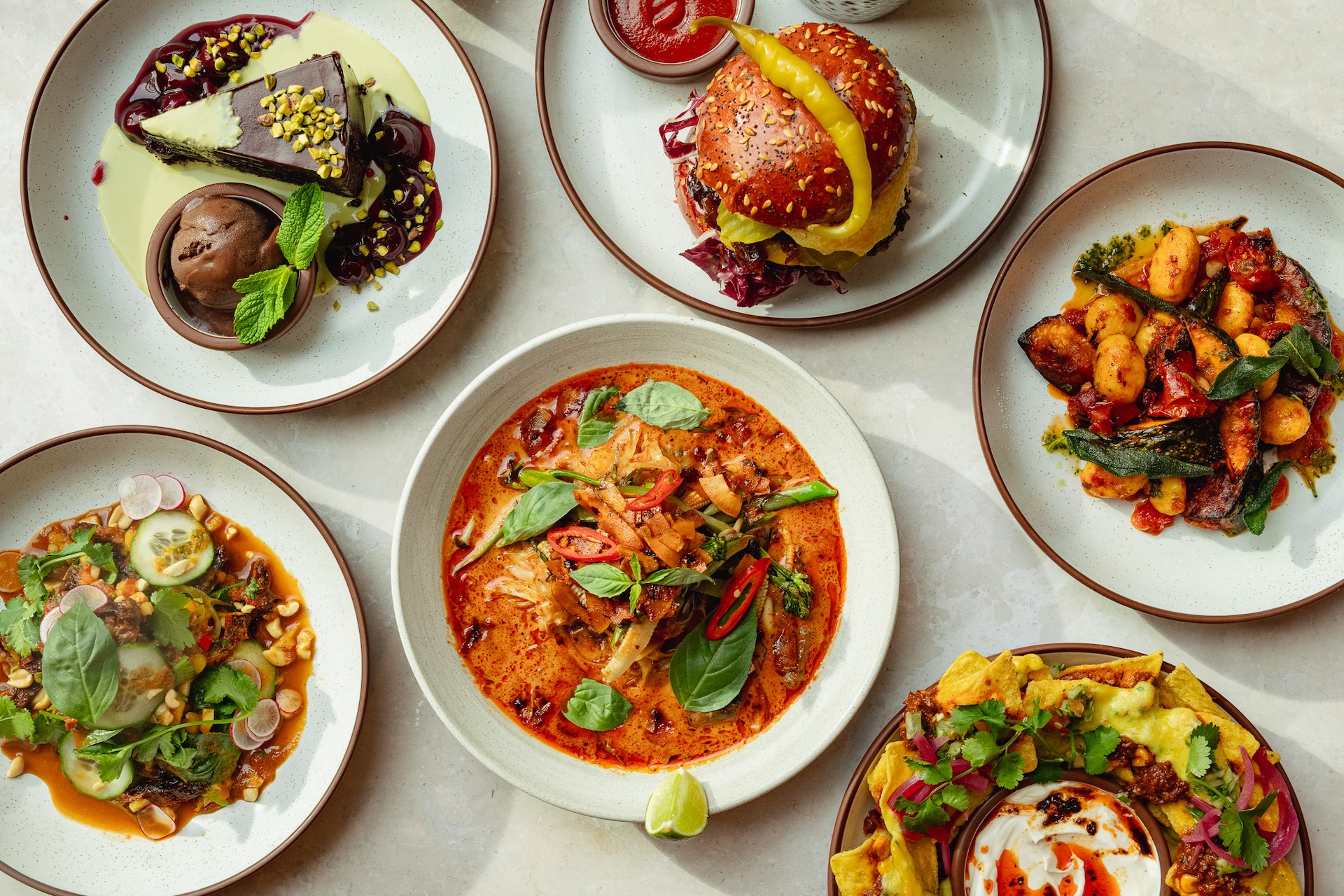A selection of colourful small plates on the table at Mildreds