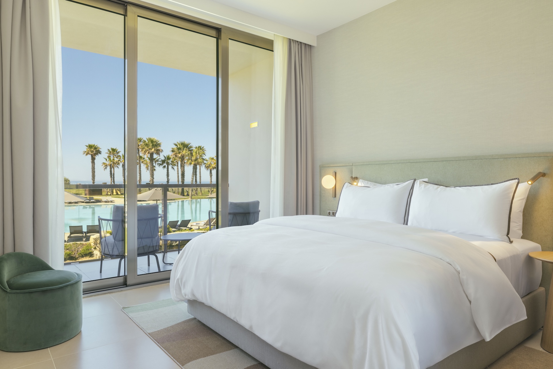 The luxurious bedroom at Wesin Salgados with balcony access