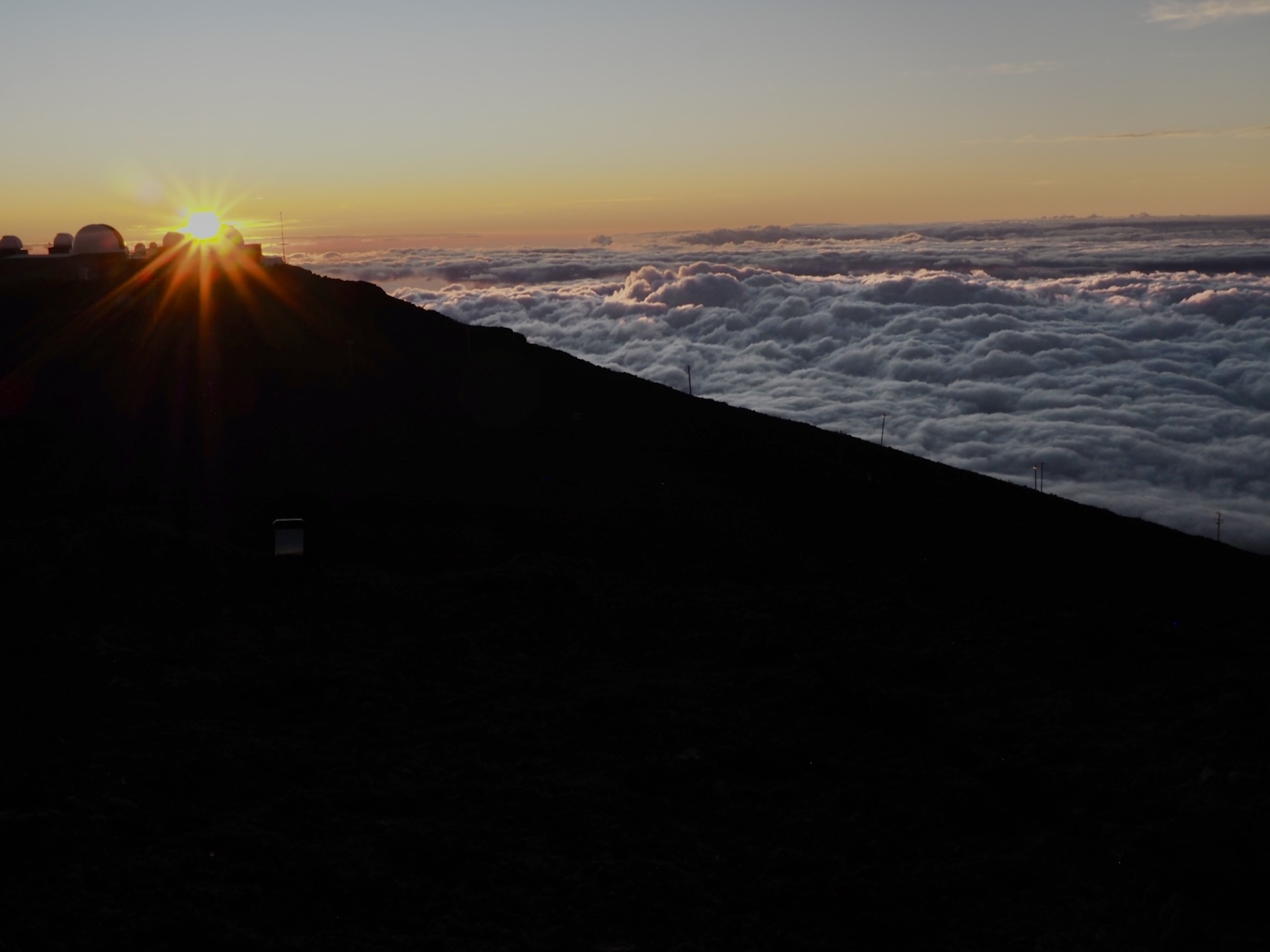 Watch the Sun Set Above the Clouds at Haleakalā (Maui)