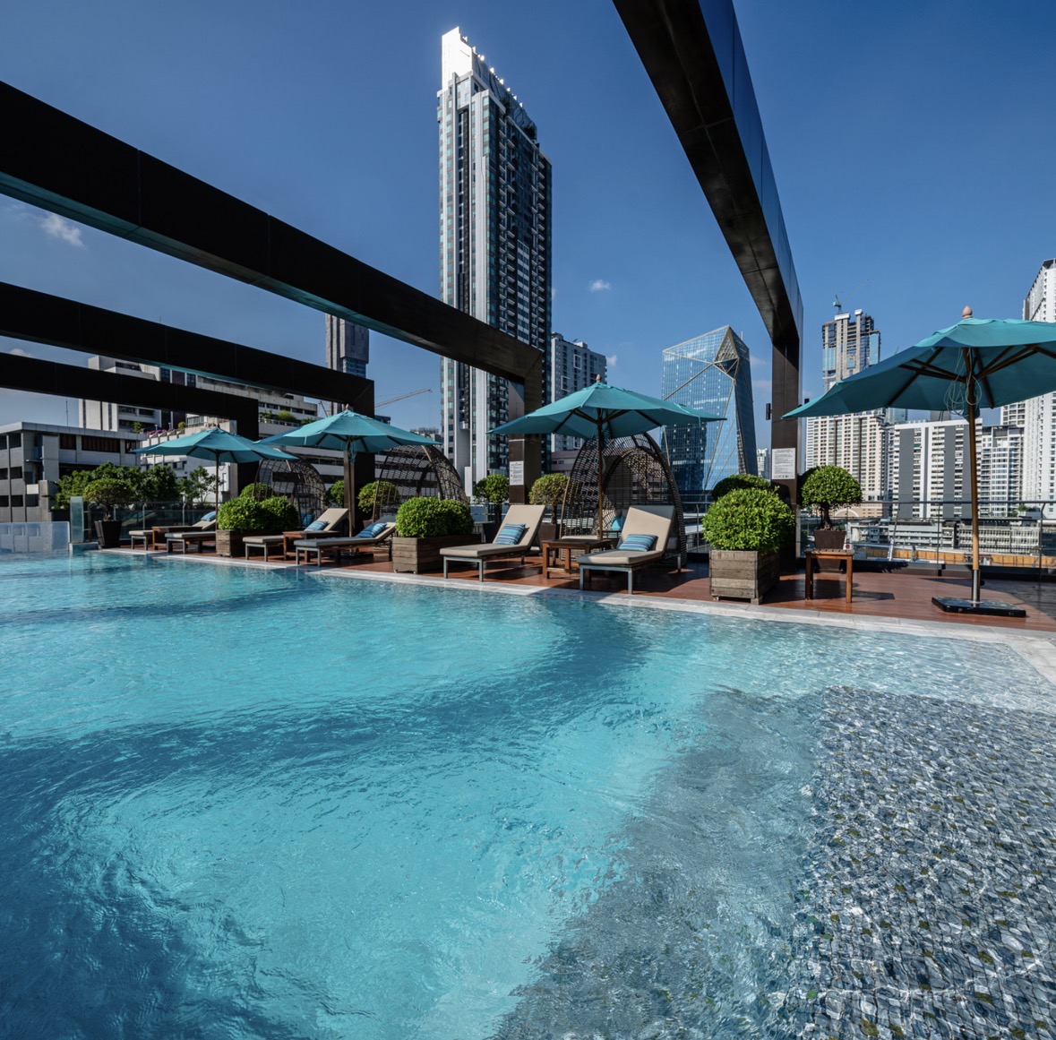 The rooftop pool at VIE Bangkok offers a moment of calm and tranquility