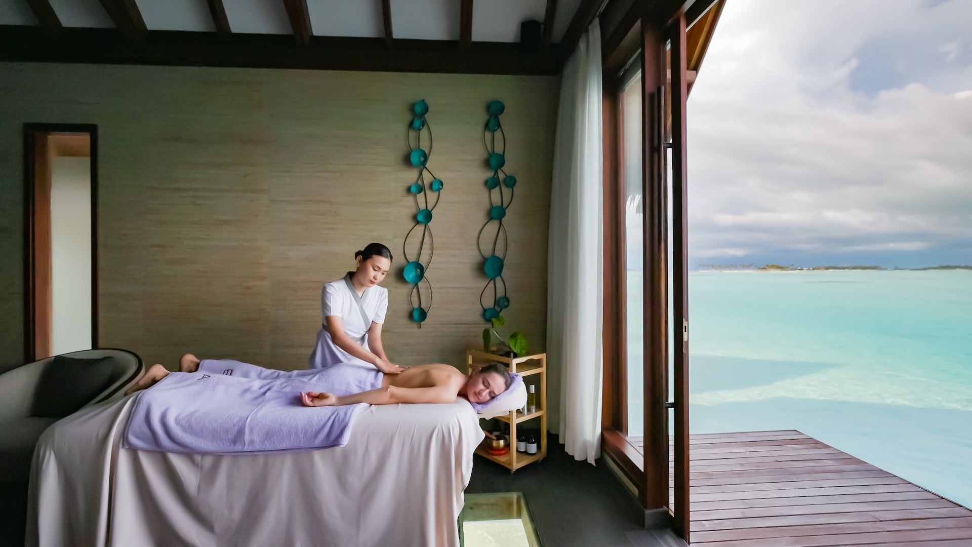Drift off while watching the fish below through a glass panel in the spa floor